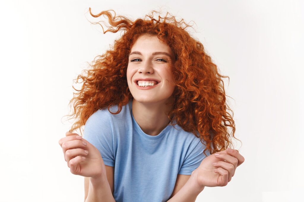 curly-girl-red-hair-woman